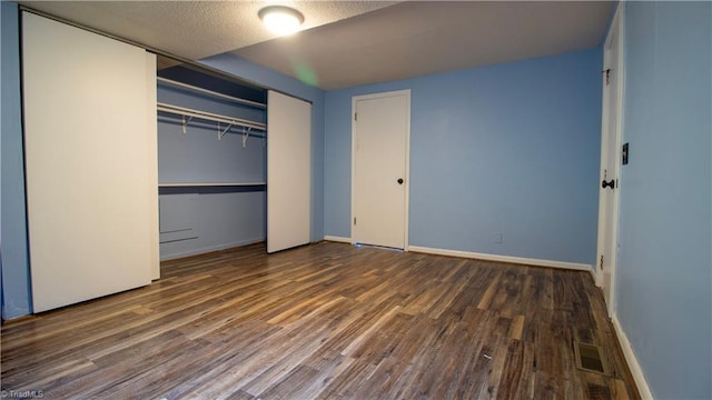 1176 Arbor Grove Church Rd, Millers Creek, NC 28697 - unfurnished bedroom featuring wood finished floors and a closet