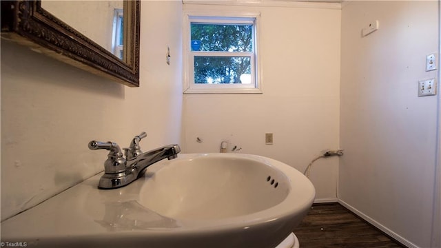 1176 Arbor Grove Church Rd, Millers Creek, NC 28697 - bathroom featuring a sink and wood finished floors
