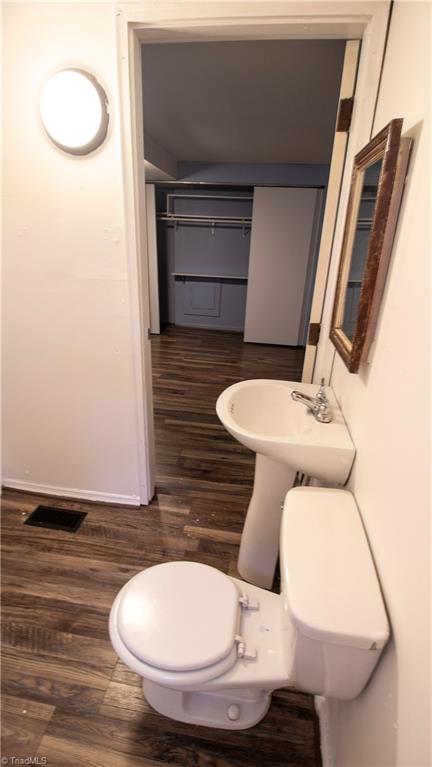 1176 Arbor Grove Church Rd, Millers Creek, NC 28697 - half bathroom featuring wood finished floors