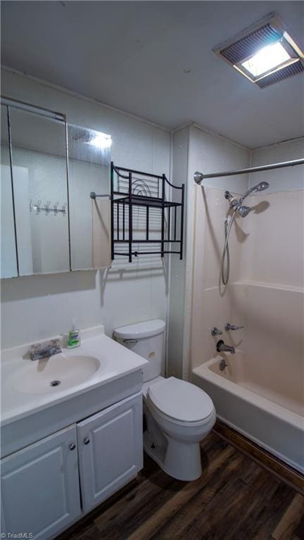 1176 Arbor Grove Church Rd, Millers Creek, NC 28697 - full bath with vanity, wood finished floors, and shower / bath combination
