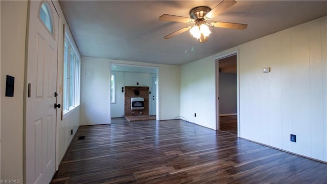 1176 Arbor Grove Church Rd, Millers Creek, NC 28697 - unfurnished living room featuring wood finished floors, ceiling fan, and heating unit