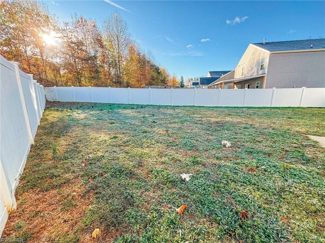 view of yard with a fenced backyard