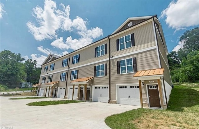 view of front of home with a garage