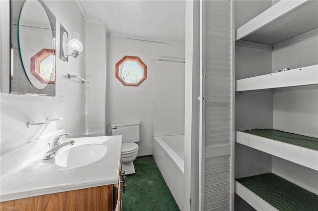 bathroom featuring vanity, a healthy amount of sunlight, and toilet