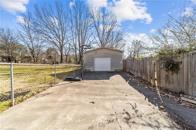 garage featuring a lawn