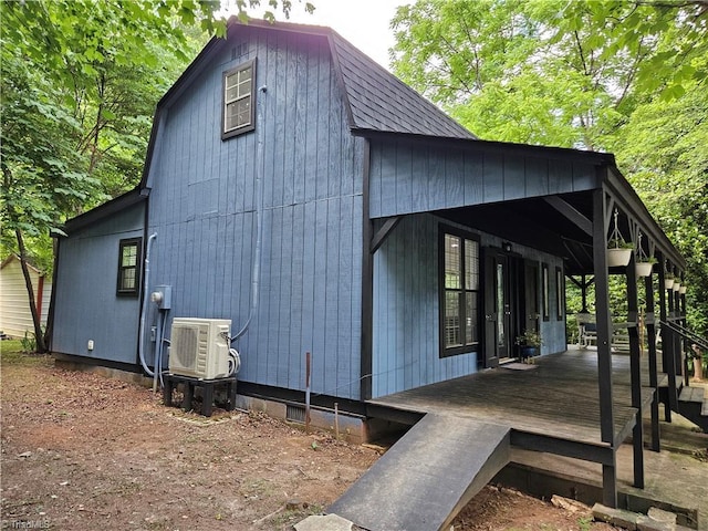 view of home's exterior with ac unit