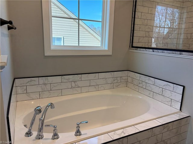 bathroom with a garden tub