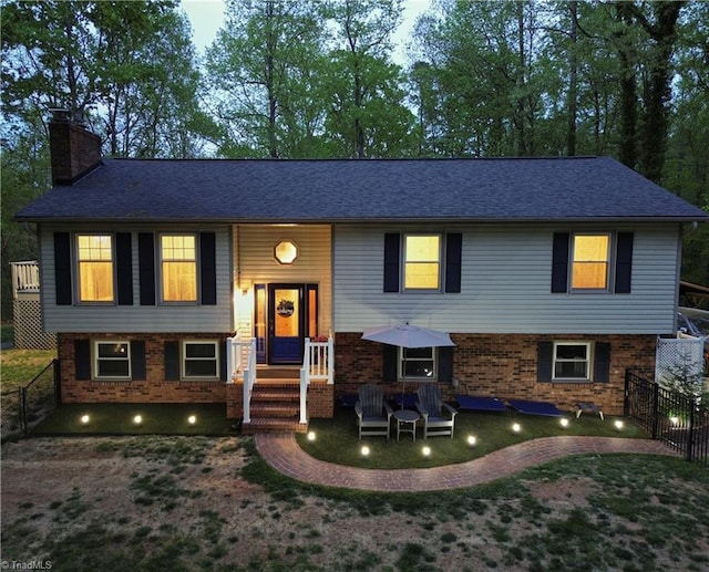 6130 Narrow Way Ln, Winston-Salem, NC 27105 - raised ranch with a chimney, brick siding, and a shingled roof