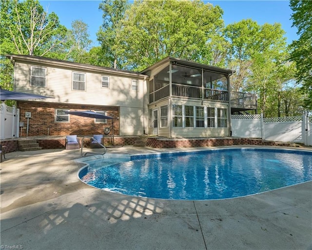 6130 Narrow Way Ln, Winston-Salem, NC 27105 - back of house with a sunroom, a patio, and fence