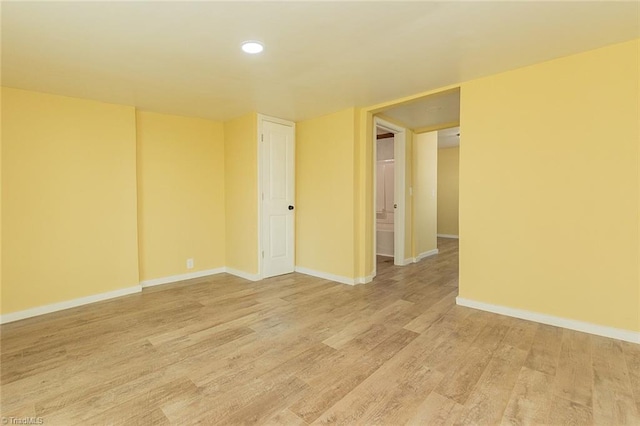 unfurnished room featuring light hardwood / wood-style floors