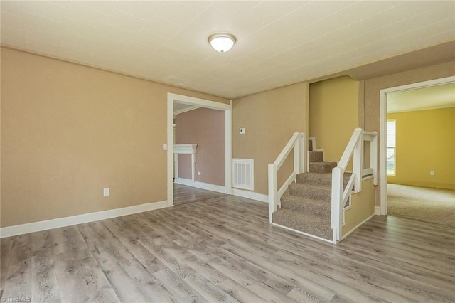 empty room with light wood-type flooring