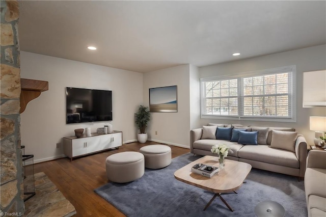 living room featuring dark hardwood / wood-style floors