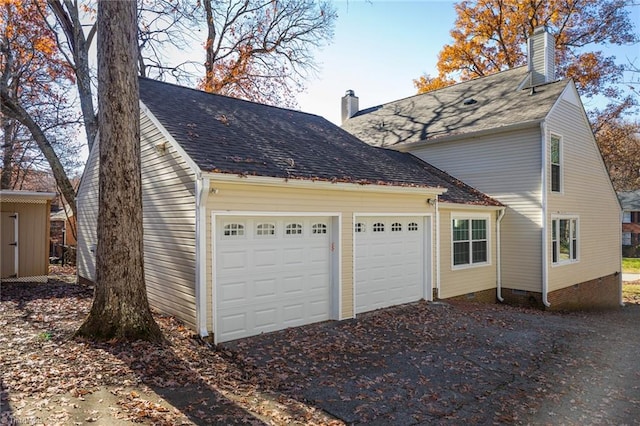 view of home's exterior with a garage