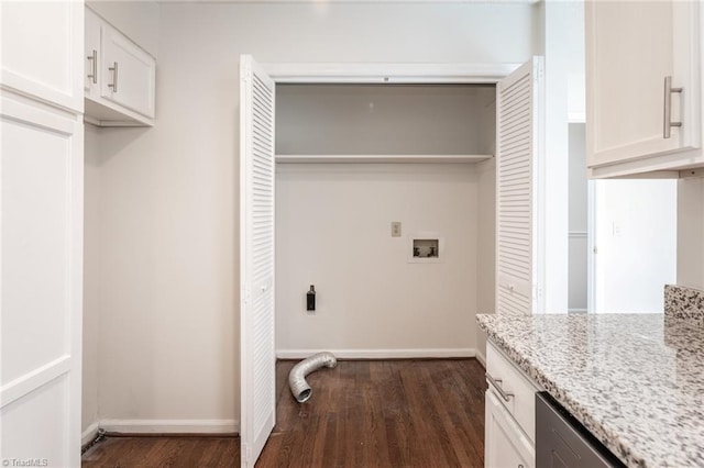 clothes washing area with hookup for a washing machine, electric dryer hookup, and dark wood-type flooring