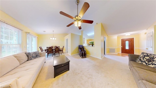 3920 Gisbourne Dr, Jamestown, NC 27282 - living room featuring baseboards, light colored carpet, lofted ceiling, and ceiling fan