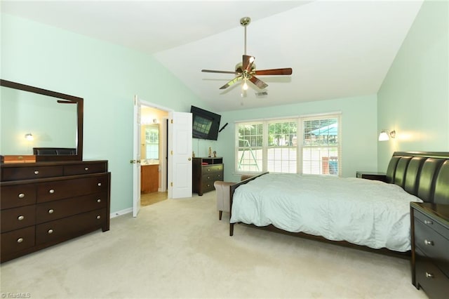 3920 Gisbourne Dr, Jamestown, NC 27282 - bedroom featuring lofted ceiling, light colored carpet, ceiling fan, baseboards, and ensuite bathroom