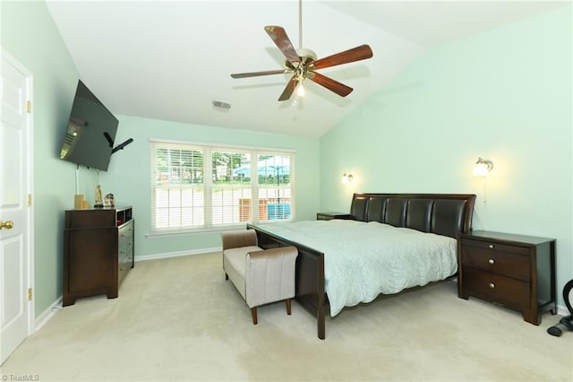 3920 Gisbourne Dr, Jamestown, NC 27282 - bedroom with lofted ceiling, light carpet, ceiling fan, and baseboards