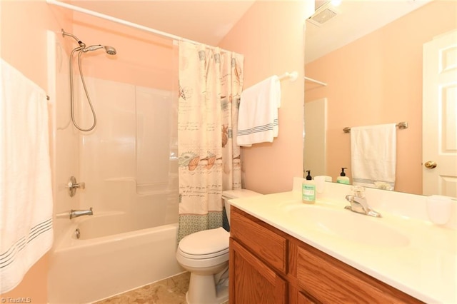 3920 Gisbourne Dr, Jamestown, NC 27282 - bathroom featuring vanity, shower / bath combo with shower curtain, and toilet