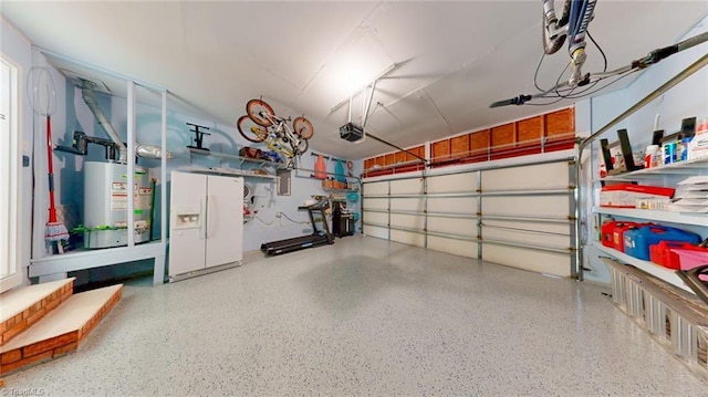 3920 Gisbourne Dr, Jamestown, NC 27282 - garage featuring white fridge with ice dispenser, water heater, and a garage door opener
