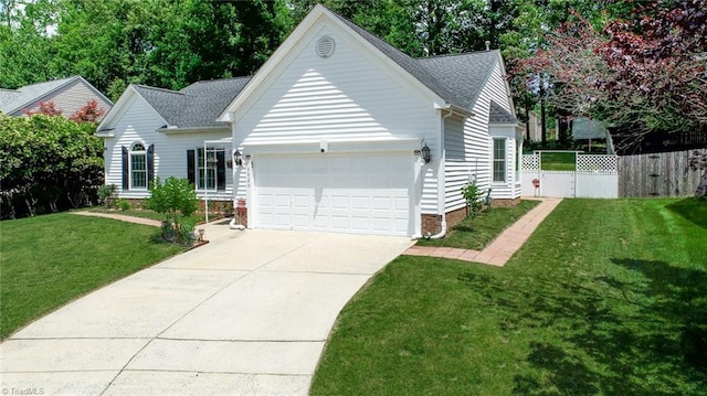 3920 Gisbourne Dr, Jamestown, NC 27282 - ranch-style house with an attached garage, concrete driveway, and roof with shingles