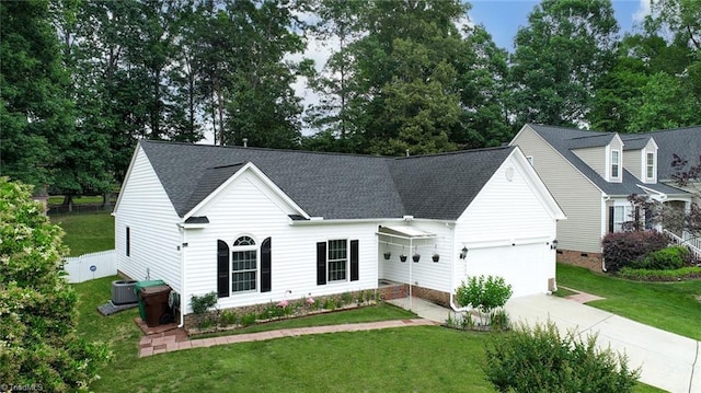 3920 Gisbourne Dr, Jamestown, NC 27282 - view of front of property featuring driveway, a front lawn, and a garage
