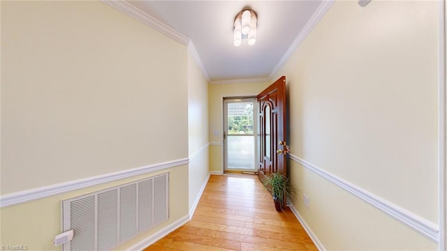 3920 Gisbourne Dr, Jamestown, NC 27282 - hallway featuring light wood-style floors, ornamental molding, and baseboards