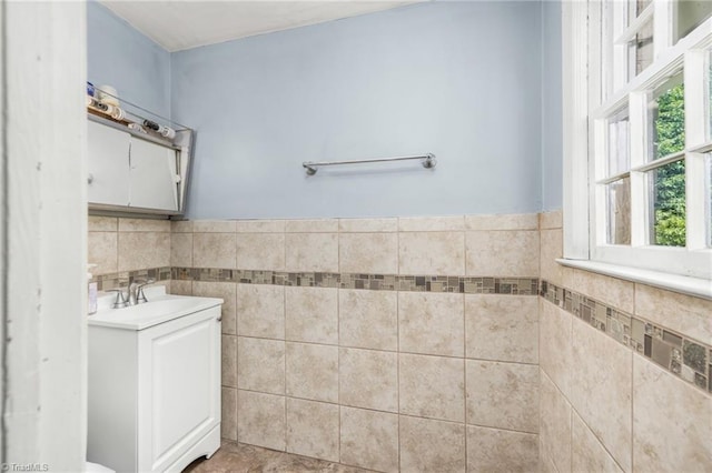 228 Barlow Cir, Winston-Salem, NC 27105 - bathroom with tile walls, a wainscoted wall, and vanity
