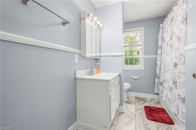 228 Barlow Cir, Winston-Salem, NC 27105 - full bath featuring toilet, vanity, and baseboards