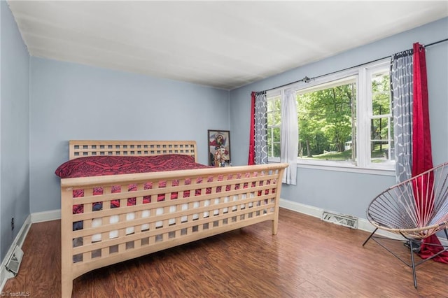 228 Barlow Cir, Winston-Salem, NC 27105 - bedroom featuring wood finished floors and baseboards