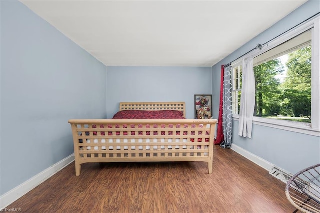 228 Barlow Cir, Winston-Salem, NC 27105 - bedroom with wood finished floors and baseboards