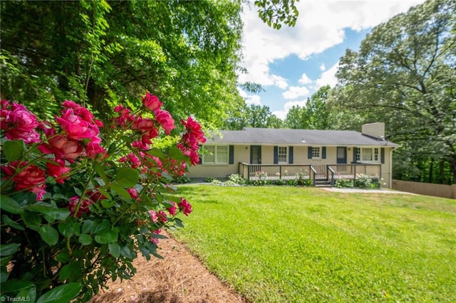 228 Barlow Cir, Winston-Salem, NC 27105 - ranch-style home featuring a front lawn and a deck