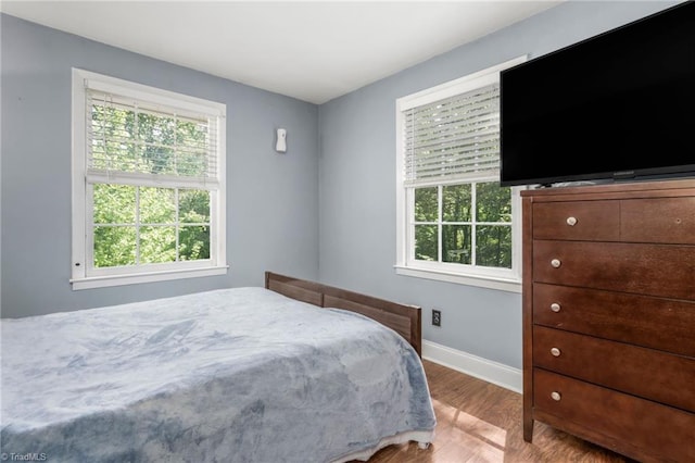 228 Barlow Cir, Winston-Salem, NC 27105 - bedroom featuring wood finished floors and baseboards