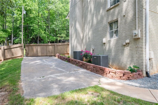 228 Barlow Cir, Winston-Salem, NC 27105 - view of side of property featuring a patio, fence, and cooling unit