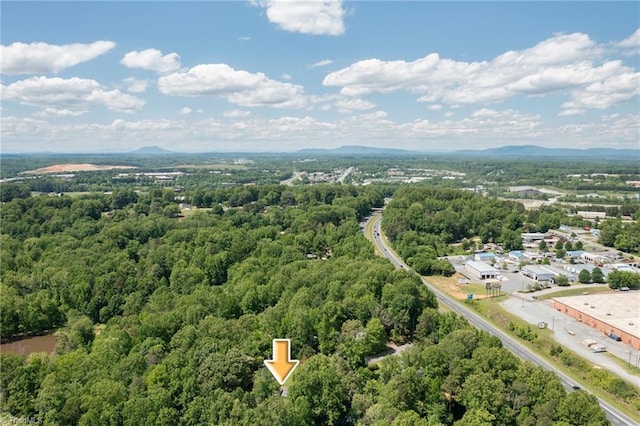 228 Barlow Cir, Winston-Salem, NC 27105 - aerial view of a heavily wooded area and a mountain backdrop