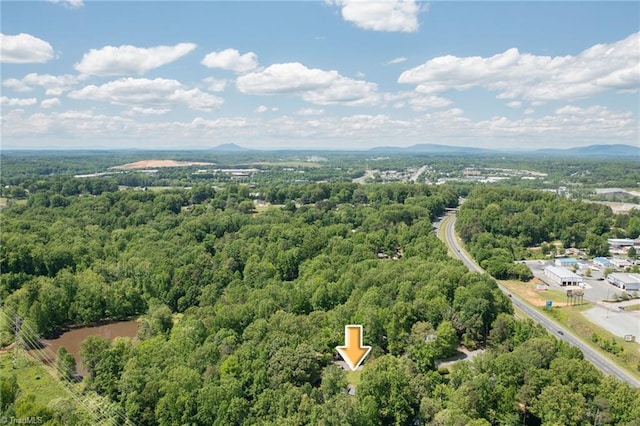 228 Barlow Cir, Winston-Salem, NC 27105 - drone / aerial view of a heavily wooded area and a mountainous background
