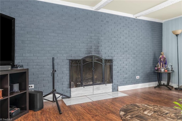 228 Barlow Cir, Winston-Salem, NC 27105 - detailed view of crown molding, wood finished floors, baseboards, and a brick fireplace