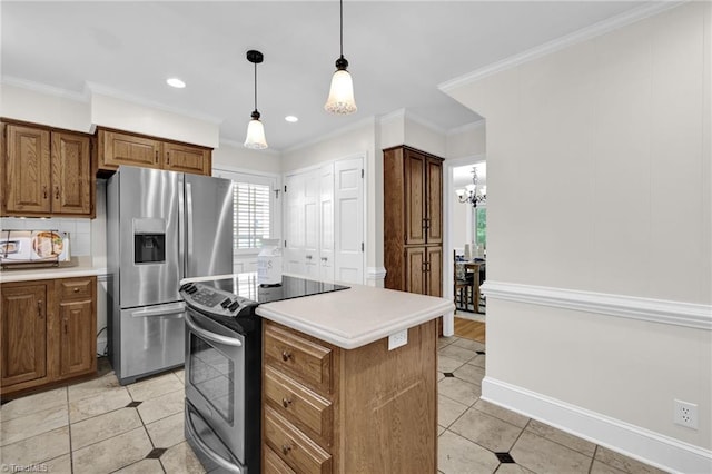 kitchen with decorative backsplash, a kitchen island, light tile patterned flooring, light countertops, and appliances with stainless steel finishes