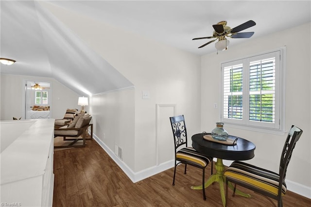 dining room featuring baseboards, ceiling fan, dark wood-type flooring, and visible vents