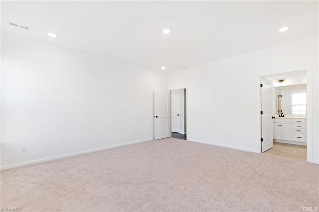 145 Oakmont Ln, King, NC 27021 - unfurnished bedroom featuring light colored carpet, baseboards, recessed lighting, and ensuite bathroom