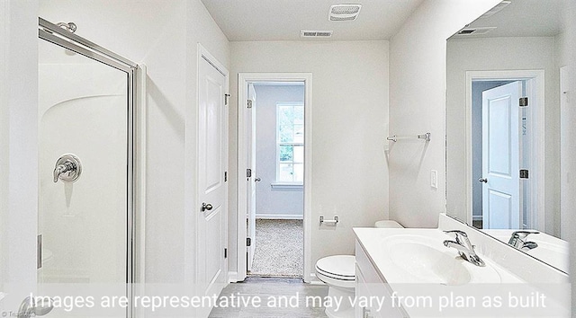 bathroom with a shower, toilet, and vanity