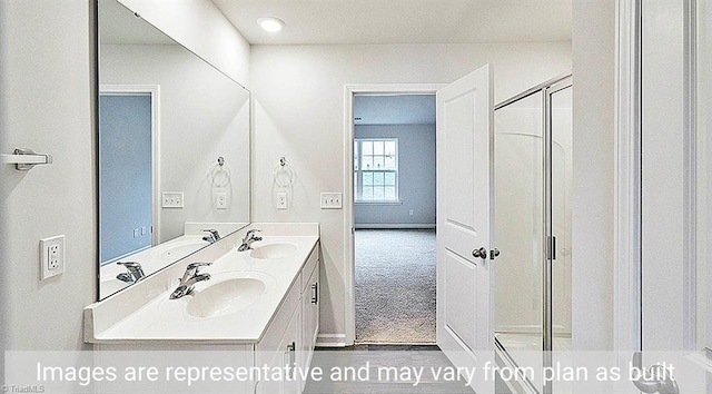 bathroom featuring walk in shower and vanity