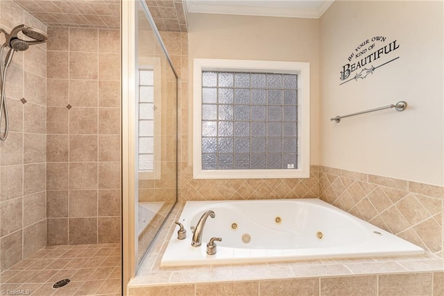 bathroom featuring crown molding and shower with separate bathtub