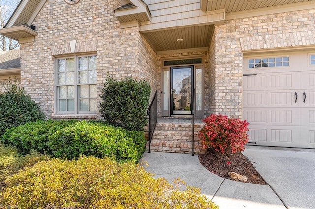 property entrance with a garage