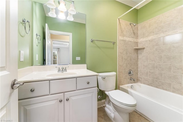 full bathroom with tiled shower / bath, vanity, toilet, and tile patterned flooring