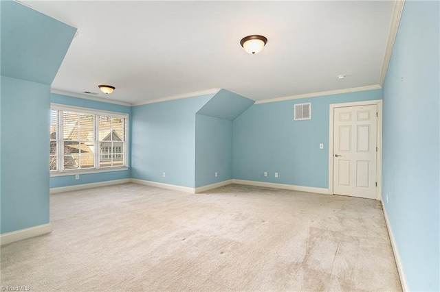 additional living space featuring light colored carpet