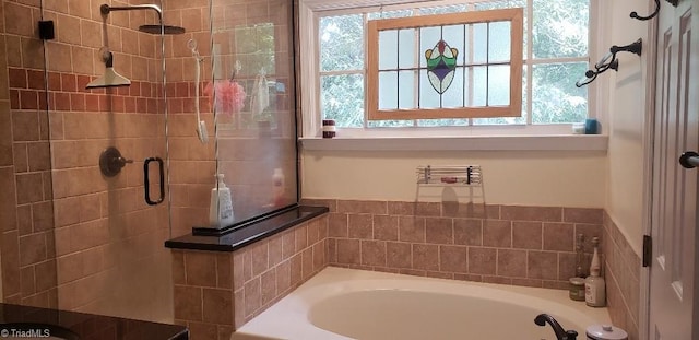 2007 Kildare Woods Dr, Greensboro, NC 27407 - bathroom featuring a stall shower, a garden tub, and healthy amount of natural light