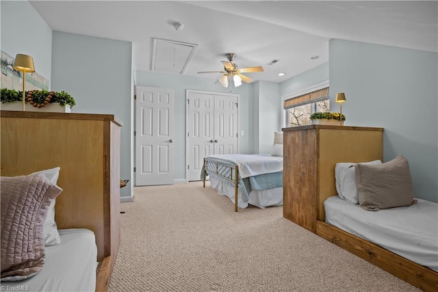 carpeted bedroom with ceiling fan