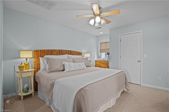 bedroom featuring ceiling fan and light colored carpet