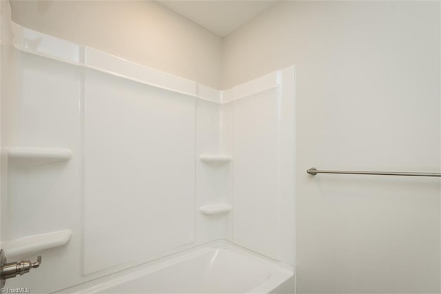 bathroom with shower / bath combination