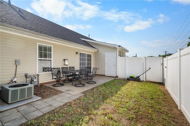 3972 Creekside Ct, Winston-Salem, NC 27127 - view of yard featuring central air condition unit, a patio area, and a gate